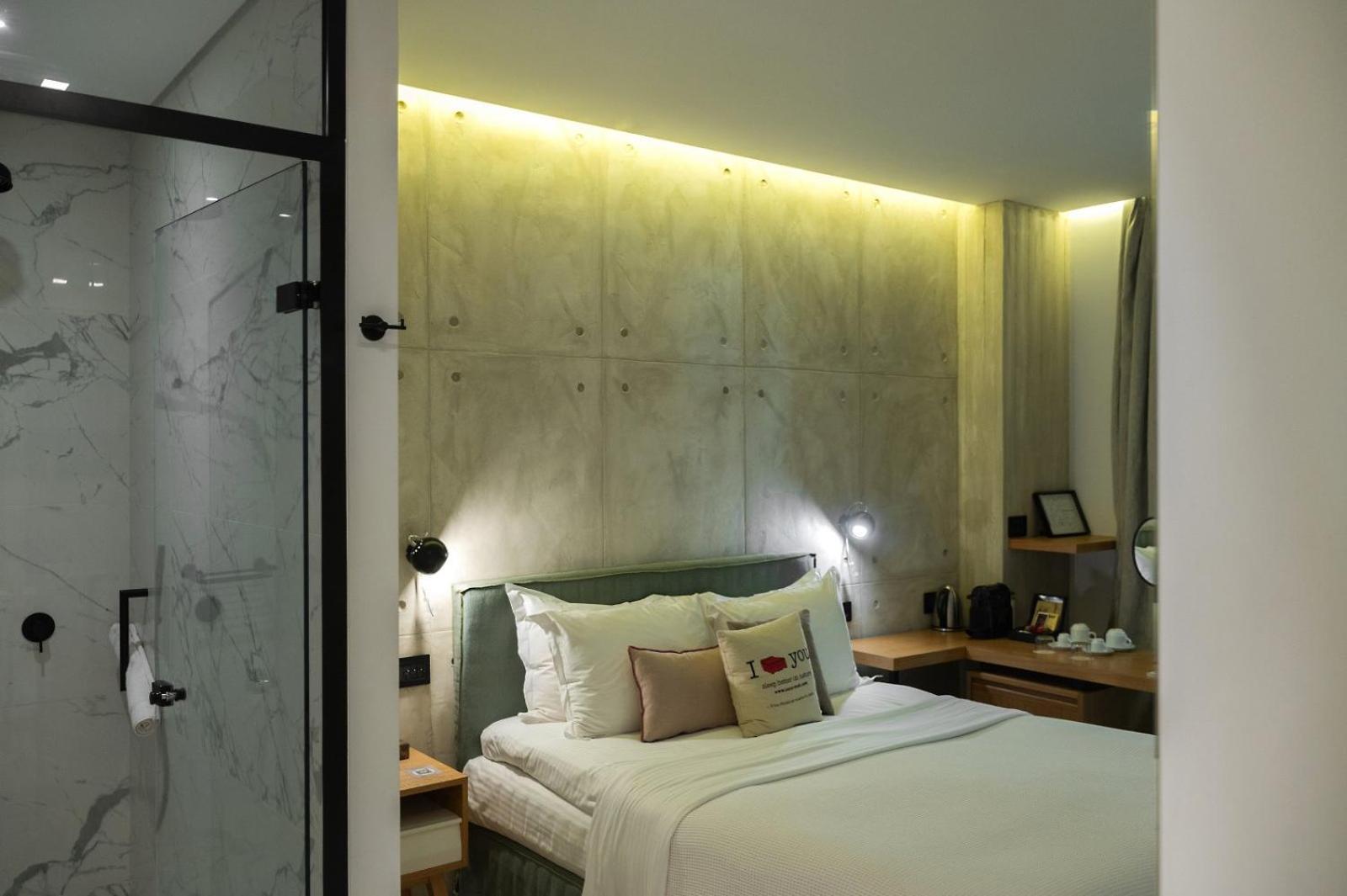 Coco-Mat Athens Jumelle Hotel Bagian luar foto A room at the hotel