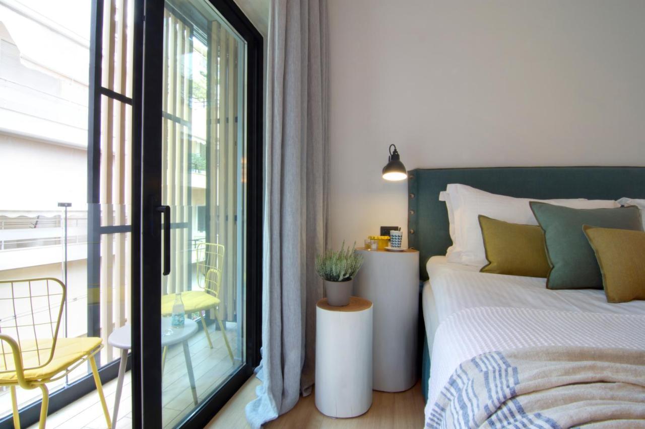 Coco-Mat Athens Jumelle Hotel Bagian luar foto A bedroom at the hotel