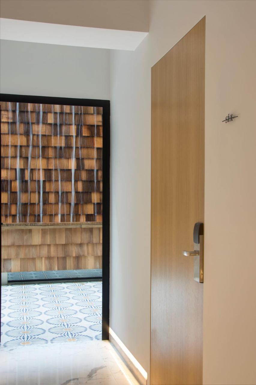 Coco-Mat Athens Jumelle Hotel Bagian luar foto A door with a water curtain