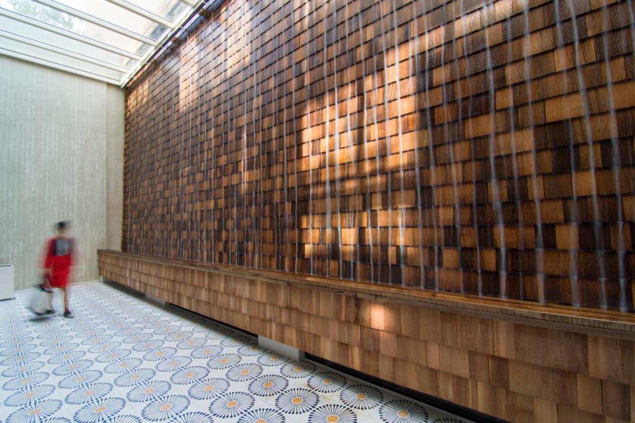 Coco-Mat Athens Jumelle Hotel Bagian luar foto Waterfall at the hotel