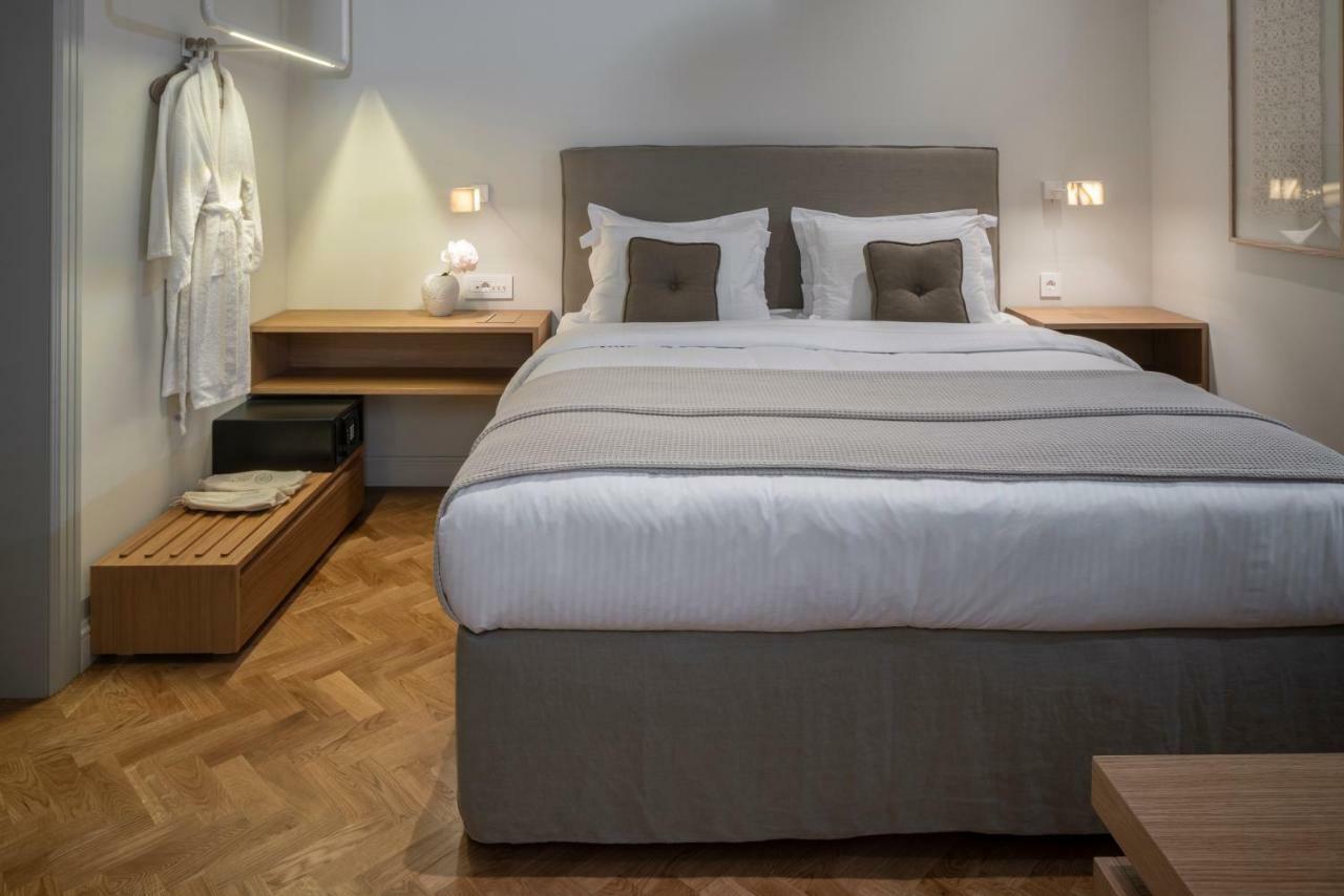 Coco-Mat Athens Jumelle Hotel Bagian luar foto A bedroom at the hotel