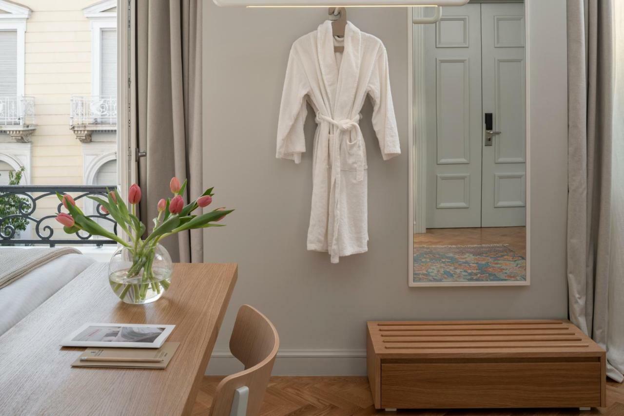 Coco-Mat Athens Jumelle Hotel Bagian luar foto A bathrobe hanging on a wall